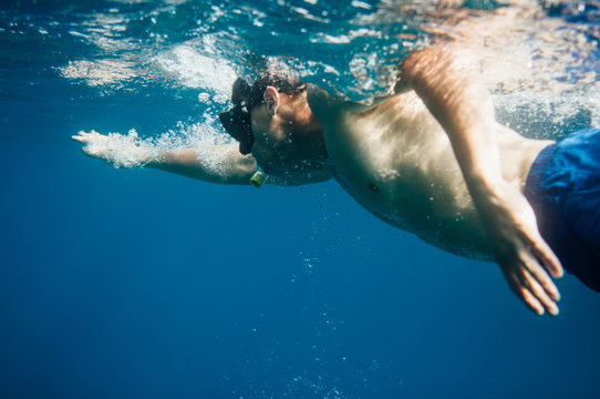 Man swimming in the ocean