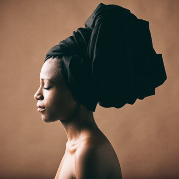 Black woman with the black turban on her head