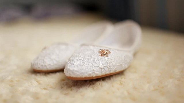 white wedding ballerina flats with Golden brooch