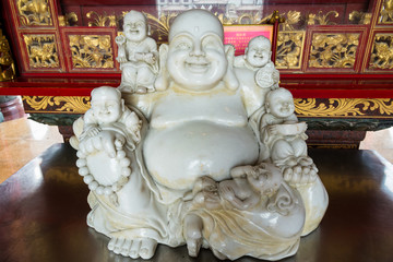 Fototapeta premium White Buddha Chinese style at Wat Leng Nei Yee 2 Temple, Nonthaburi, Thailand.