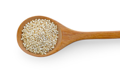 Quinoa in a spoon on white background