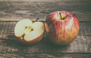 Apples on wooden background