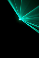 Laser beam  light blue on a black background