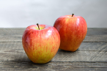 Apples on wooden background