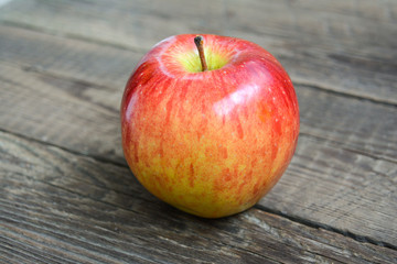 Apple on wooden background