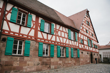 Naklejka premium Traditional house in the German style in Bavaria. The architecture of houses in Germany.