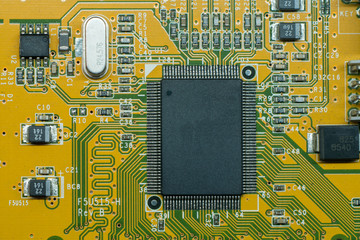 Close up of electronic multi layer circuit board, PCB, with microchip and components