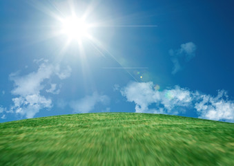 Obraz na płótnie Canvas 青空と太陽と緑の丘