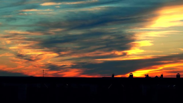 Beautiful multicolor evening sky. 4K telephoto lens shot