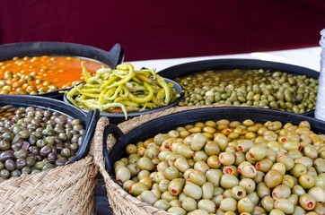Bowl of olives for sale at market