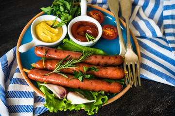 Grilled sausages with rosemary