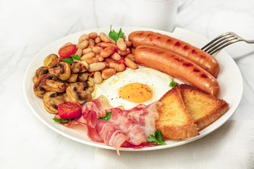 Photo of English breakfast plate with coffee and copyspace