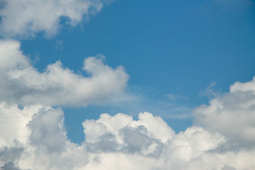 Naklejka na ściany i meble white clouds on blue sky