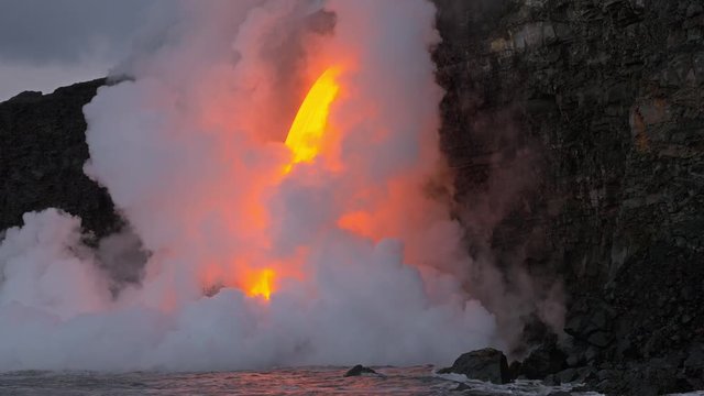 Lava from the Kīlauea volcano flows into the ocean on the Big Island of Hawaii