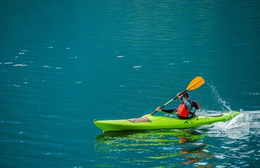 Caucasian Kayaker on the Lake