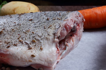 Fish with vegetables before cooking