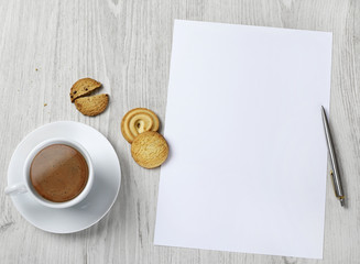 Obraz na płótnie Canvas Blank paper and coffee