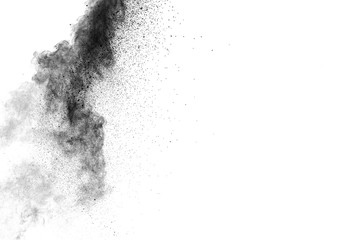 particles of black dust on white background,abstract powder splatted on white background