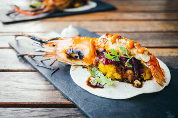 Taco with prawn or shrimp and sauce