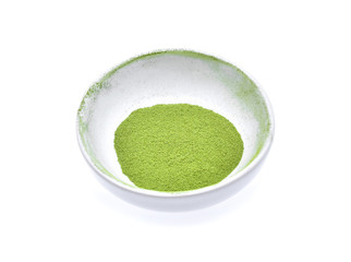 Powder green tea isolated on white background