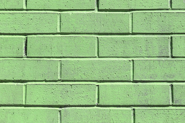 Green painted brick wall texture