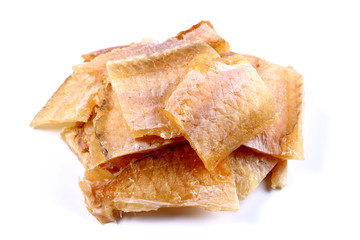 Pieces of Silver Cod Fish on a white background (isolated). Snack to beer. Close up