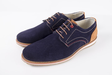 Male Blue Shoe on White Background, Isolated Product, Top View, Studio.