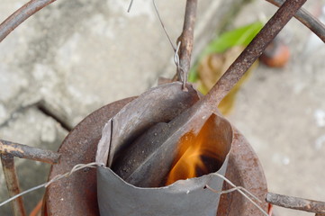 soldering iron burn in tin bucket for steel welding work