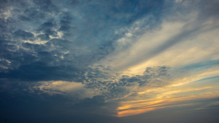 Naklejka na ściany i meble Dramatic sky with cloud at sunset.