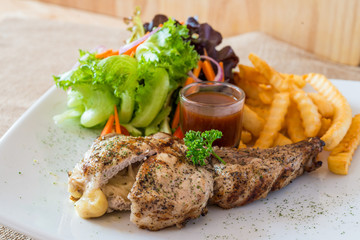 Grilled pork chop  with cheese