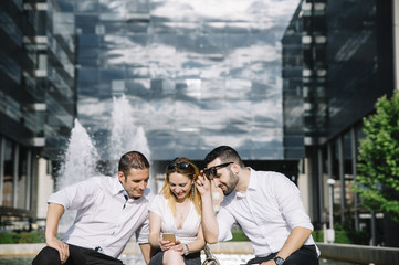 Three happy friends in the city