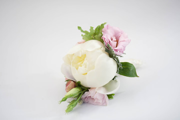 Boutonniere with pion, bouquet of groom