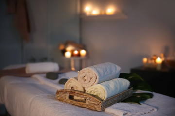 Interior of modern massage room in candle light