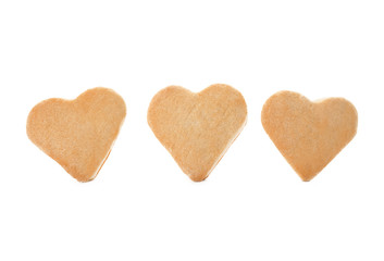 Heart shaped butter cookies on white background