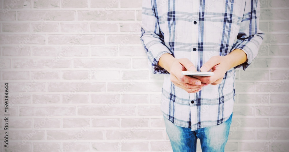 Poster composite image of mid section of man using smart phone