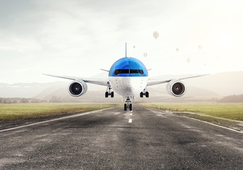 Fototapeta na wymiar Airplane over runway. Mixed media