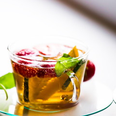 Drink. Pimms in tea cup, white background