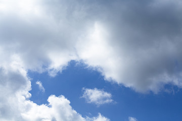 white clouds against blue sky