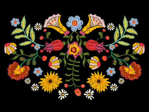 Embroidery ethnic pattern with colorful flowers. Vector traditional floral bouquet. Tribal style design for fashion wearing.