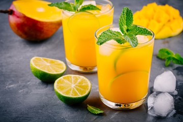 Fresh summer mango lemonade with lime and mint