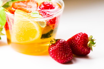 Drink. Pimms in tea cup, white background