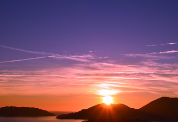 Beautiful summer sunset on the mountins  at Italy