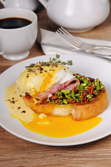 Toast with guacamole with egg Benedict
