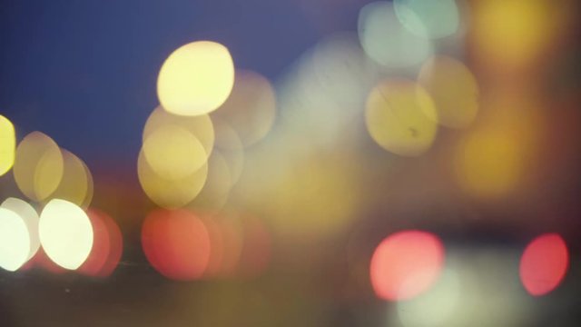 Defocused traffic lights at night in Moscow