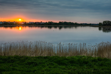 Sunset over pond Raszynski near Warsaw, Poland