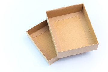 Empty craft paper cardboard box isolated on a white