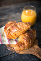 Croissant and orange juice continental breakfast