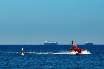 Red pilot boat