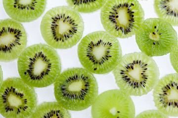 Green kiwi fruit slice. Juicy freshness food background
