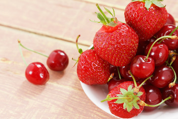 Fruit background, cherry and strawberry, copy space